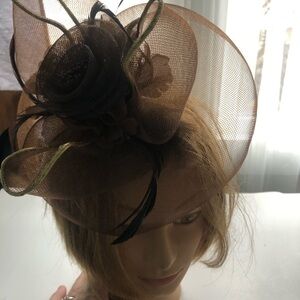 Elegant fascination in brown colours. Classic fascinator with feathers- used
